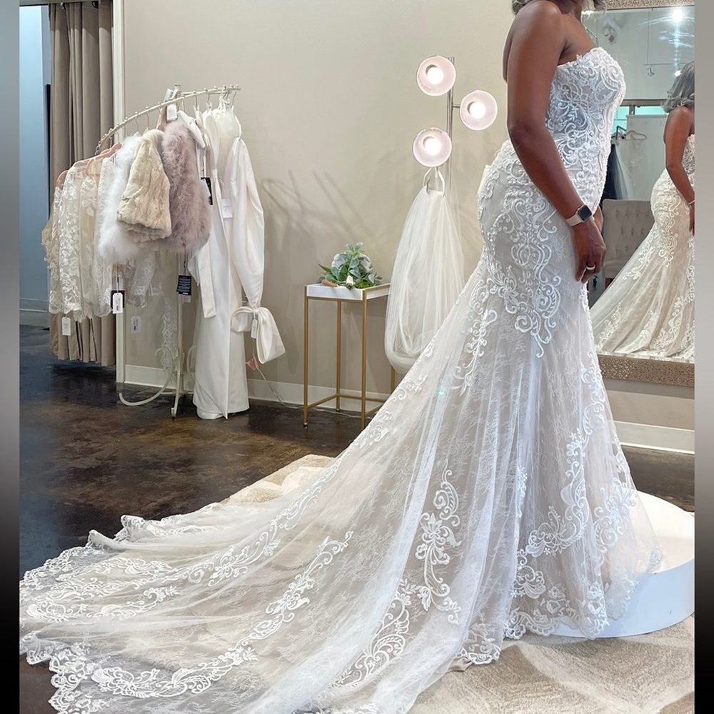 dress is size 16 (runs small) which will be good for alterations if needed.